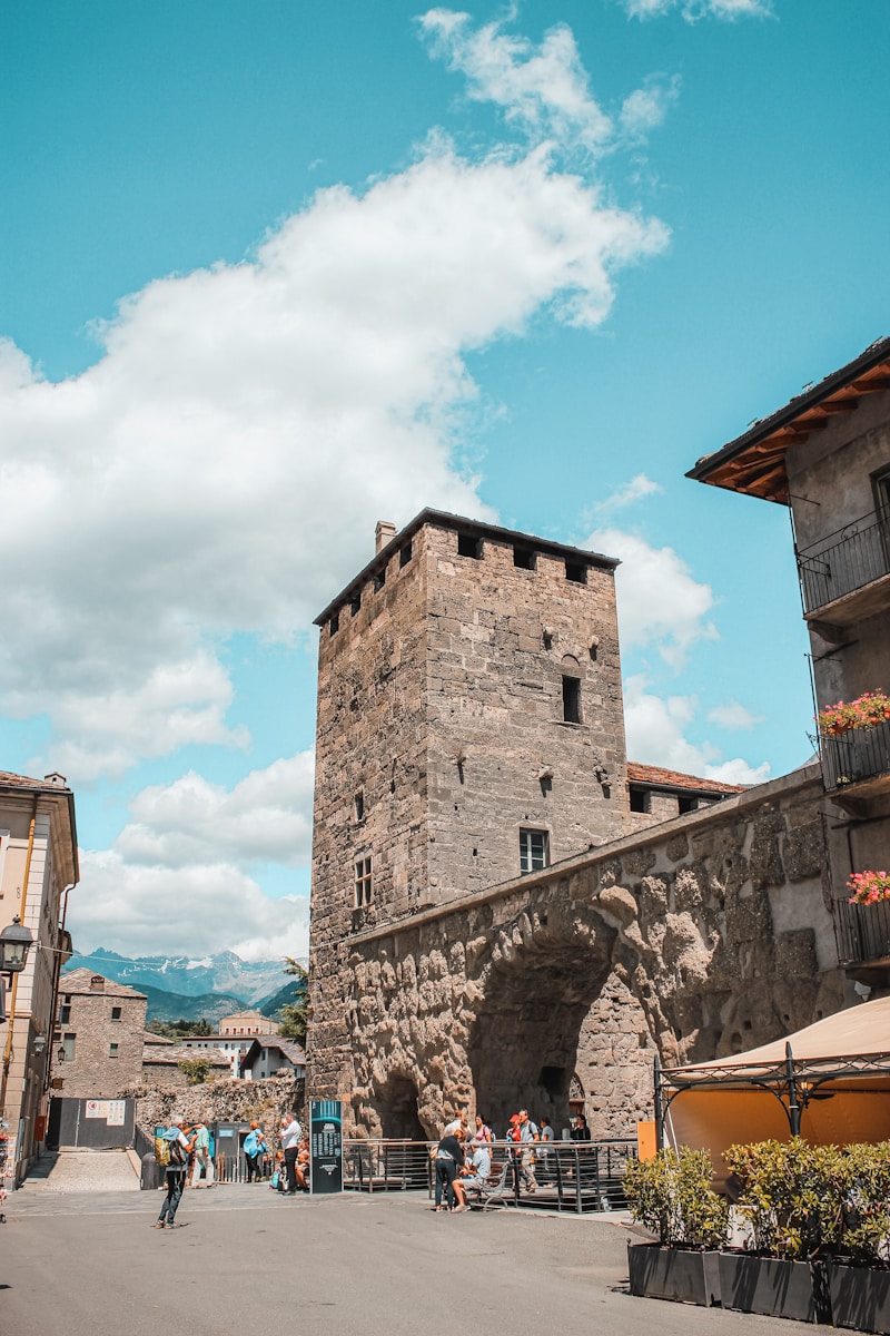 brown brick building under blue sky during daytime